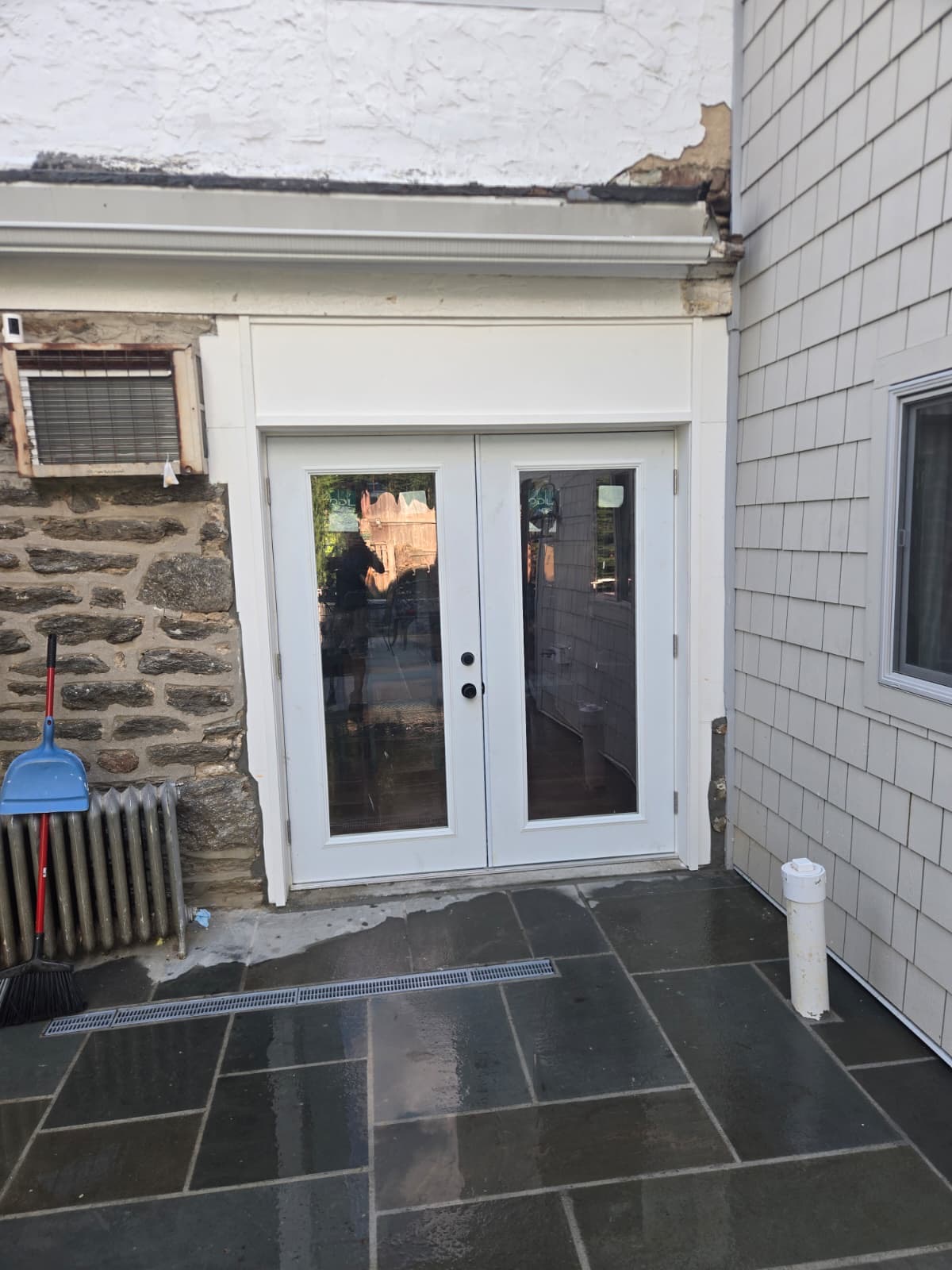 French patio doors opening onto the bluestone patio