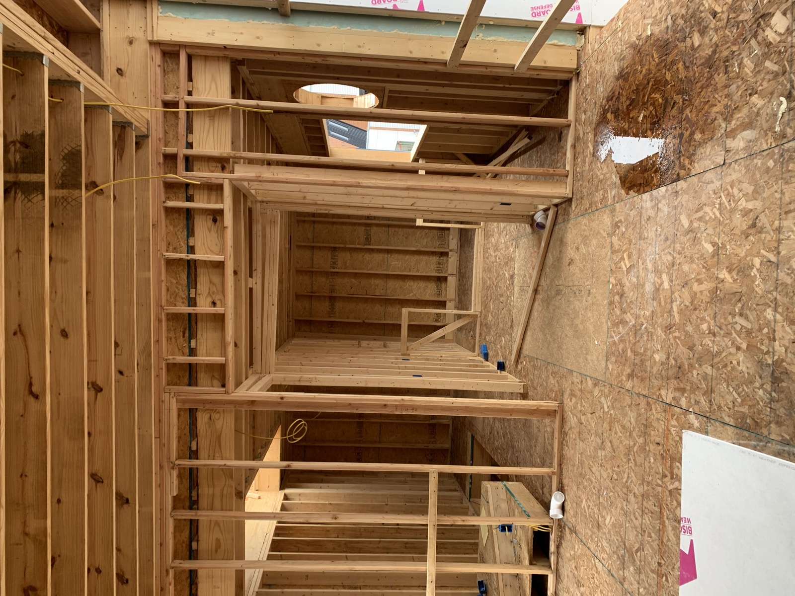 Stud-framed rooms and doorway openings on the second floor