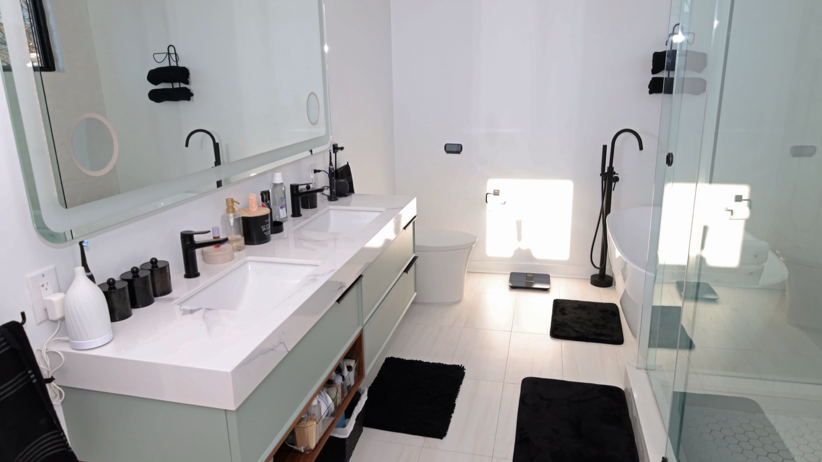 Marble-top double vanity with LED mirror