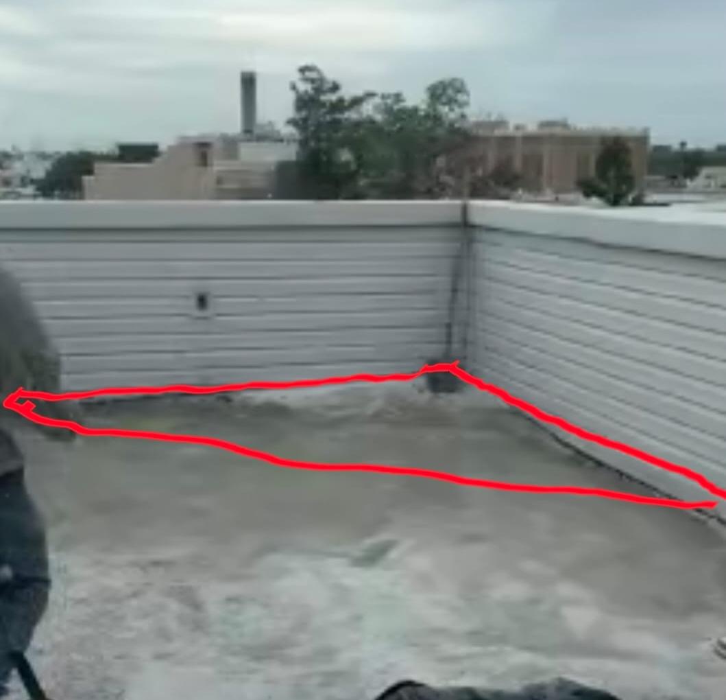 Before: corner of the roof deck marked out for the new framed platform