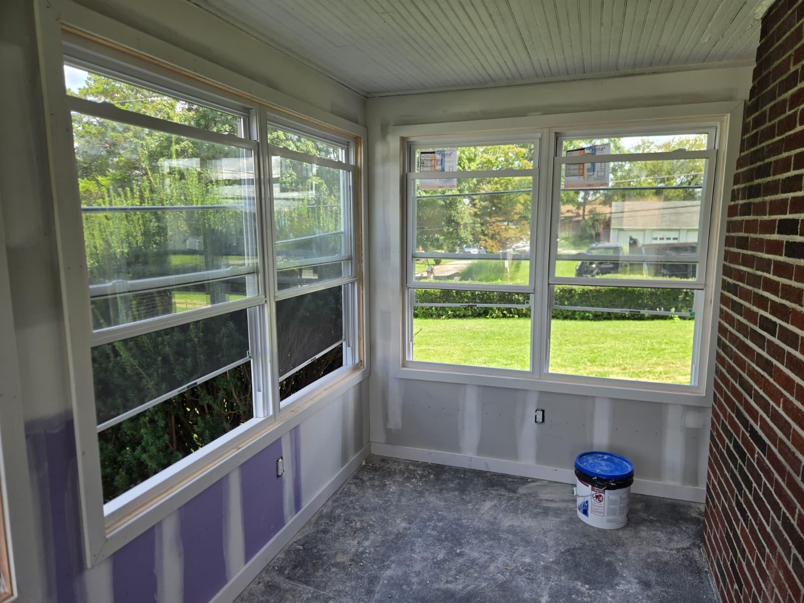 In progress: window wall trimmed out before paint